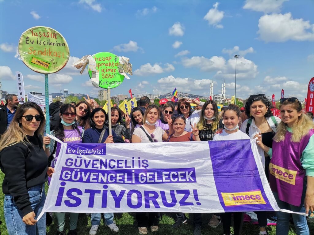 4- Women are marching with a banner saying We are domestic workers! We demand safe work and a secure future! in Kadıköy to mark Domestic Cleaners' Day on June 16